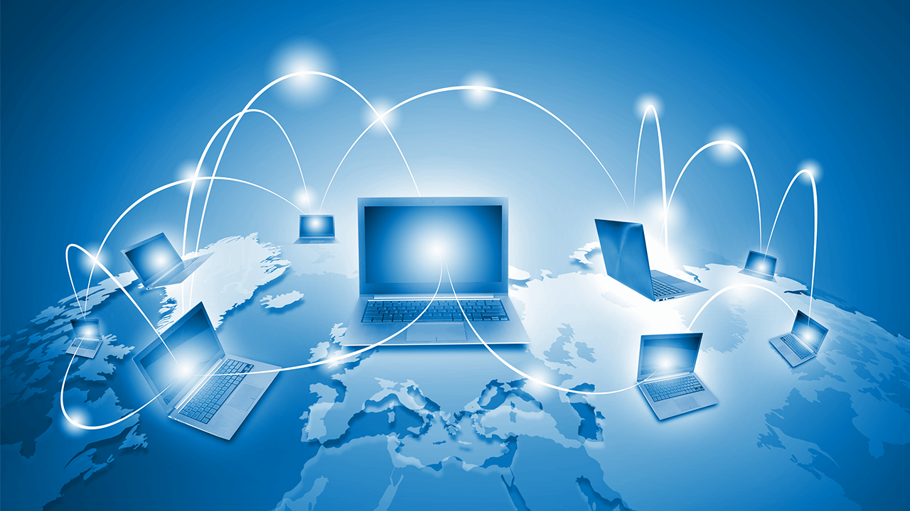 Laptops against globe